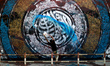 Palestinian artist Bilal Khaled draws on a wall ordinate in Gaza city on July 1, 2021. "Gr...