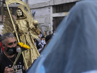 Followers of Santa Muerte in Tepito, Mexico City, Mexico, on July 1, 2021, go to her temple to give thanks for favours fulfilled, also known...