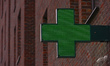 Neon pharmacy cross sign seen in Dublin city center.From Monday, pharmacies will be offer...
