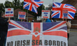 A group of Loyalists holds a protest against the Northern Ireland Protocol at the entrance...