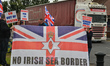 A group of Loyalists holds a protest against the Northern Ireland Protocol at the entrance...