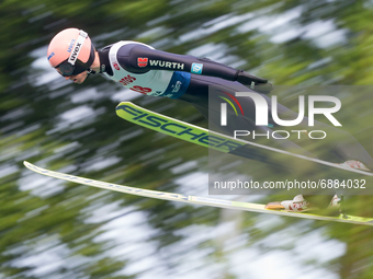 Karl Geiger (GER) during the Large Hill Competition of FIS Ski Jumping Summer Grand Prix In Wisla, Poland, on July 17, 2021. (