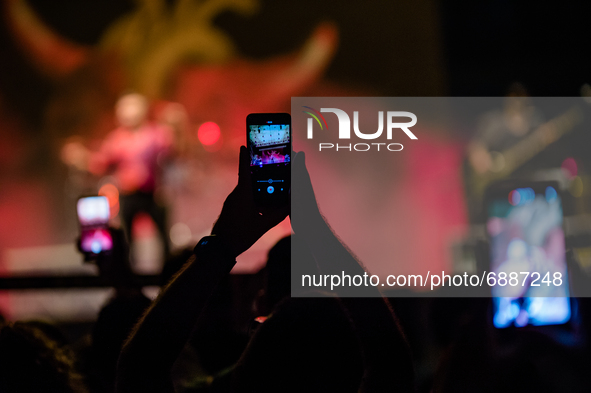 Piero Pelù's fans take photos with a smartphone during his concert in Molfetta at Banchina Seminario on 18 July 2021.
On the occasion of th...