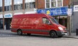 Royal Mail Parcel force postal van outside shops in high street Worthing West Sussex