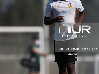 Yunus Musah of Valencia during the warm-up before the Pre-Season friendly match between Valencia CF and Villarreal CF at Oliva Nova Beach &...