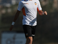 Jesus Vazquez of Valencia during the warm-up before the Pre-Season friendly match between Valencia CF and Villarreal CF at Oliva Nova Beach...