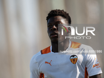 Yunus Musah of Valencia during the warm-up before the Pre-Season friendly match between Valencia CF and Villarreal CF at Oliva Nova Beach &...