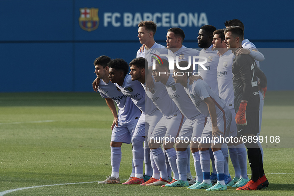 Barcelona line up prior to the pre-season friendly match between FC Barcelona and Girona FC at Estadi Johan Cruyff on July 24, 2021 in Barce...