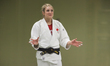 Canadian Olympian Kelita Zupancic instructs judo students on proper technique in Toronto,...