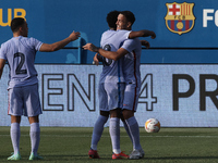 Rey Manaj of Barcelona celebrates after scoring his sides first goal during the pre-season friendly match between FC Barcelona and Girona FC...