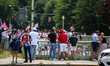 Supporters watch as demonstrators march under an overpass during a demonstration for Cuban...