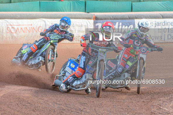   Ryan Douglas   (Red) leads Tom Brennan (White) and Leon Flint  (Blue)during the SGB Premiership match between Wolverhampton Wolves and Bel...