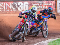   Tom Brennan  (Yellow) leads Rory Schlein  (Red)during the SGB Premiership match between Wolverhampton Wolves and Belle Vue Aces at the Lad...