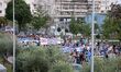 Hundreds of people, less than the big previous rally, are seen at the Demonstration Agains...