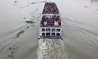 An overloaded passenger vessel have seen today on river Buriganga where all the passenger...