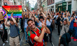 People are jumping and shouting slogans against homophobia, during the celebration of the...