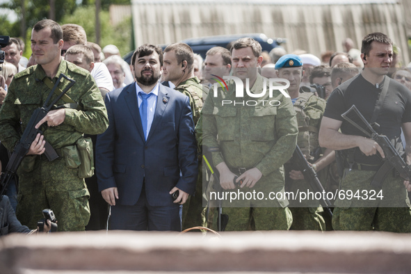 Denish Pushilin and Alexander Zakharchenko during an outdoor holy mass in memory of the dead passengers of the tragedy of the malaysian flig...
