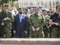 Denish Pushilin and Alexander Zakharchenko during an outdoor holy mass in memory of the dead passengers of the tragedy of the malaysian flig...