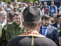 Alexander Zakharchenko  and Denish Pushilin during an outdoor holy mass in memory of the dead passengers of the tragedy of the malaysian fli...