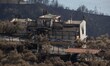 A house burned in Limni. The aftermath of the fires in Greece, while little flames still a...