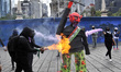 Members of the Feminist group 'Black Like Obsidian', take part during a demonstration to p...