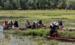 The womenfolk who outnumber men in Wular Lake help their families to make ends meet by row...