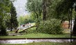 Storm damage with fallen trees in a park on July 26, 2021 in Bergamo, Italy. 