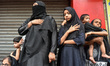 Females of Muslim community reacts in remembrance of the death of Hasyn Ali during and Ash...