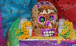 Decorated skull amongst offerings during the Day of the Dead celebrations in Toronto, Onta...