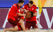 Dejan Stankovic (C) of Switzerland celebrates his goal with Tobias Steinemann (L) and Mich...