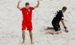 Eliott Mounoud (R) of Switzerland reacts as Aleh Hapon of Belarus celebrates his goal duri...