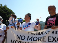 Virginia Kase Solomón, CEO of the the League of Women Voters of the United States participates in a civil disobedience as demonstrators zip-...