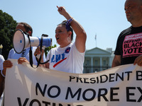 Virginia Kase Solomón, CEO of the the League of Women Voters of the United States participates in a civil disobedience as demonstrators zip-...