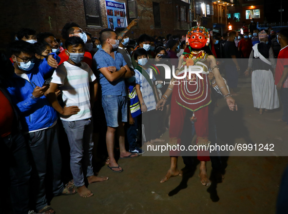 A masked dancer takes part in the Nil Barahi mask dance festival in Bode, Bhaktapur August 25, 2021. The festival is an annual event during...