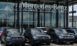 A row on a new Mercedes-Benz Luxury vehicles parked outside a Mercedes-Benz dealership in...
