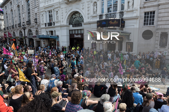 LONDON, UNITED KINGDOM - AUGUST 25, 2021: Environmental activists from Extinction Rebellion gather in Piccadilly Circus on the third day of...