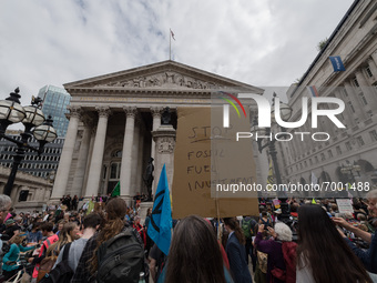 LONDON, UNITED KINGDOM - AUGUST 27, 2021: Environmental activists from Extinction Rebellion gather outside Bank of England ahead of a march...