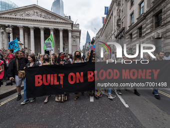 LONDON, UNITED KINGDOM - AUGUST 27, 2021: Environmental activists from Extinction Rebellion gather outside Bank of England ahead of a march...