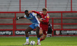  Festus Arthur of Barrow in action with Tommy Leigh of Accrington Stanley  during the EFL...