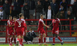 Colby Bishop of Accrington Stanley celebrates with Joel Mumbongo after scoring their first...