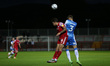 Patrick Brough of Barrow contests a header with Accrington Stanley's Liam Coyle during the...