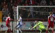 Barrow's Scott Moloney saves from Accrington Stanley's Colby Bishop    during the EFL Trop...