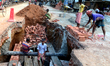Bangladeshi men daily labor works in a road construction side in Dhaka, Bangladesh, on Sep...
