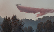 BEIT SHEMESH, July 24, 2015 () -- An aircraft drops fire retardant to quench the hotspots...