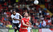 Oldham Athletic's Vani Da Silva tussles with Craig Clay of Leyton Orient during the Sky Be...