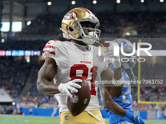 San Francisco 49ers wide receiver Trent Sherfield (81) scores a touchdown during the first half of an NFL football game against the Detroit...