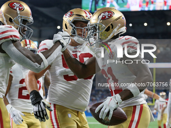 San Francisco 49ers wide receiver Trent Sherfield (81) celebrates his touchdown during the first half of an NFL football game against the De...