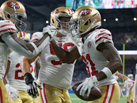 San Francisco 49ers wide receiver Trent Sherfield (81) celebrates his touchdown during the first half of an NFL football game against the De...