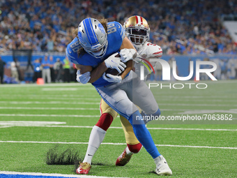 Detroit Lions tight end T.J. Hockenson (88) scores a touchdown during the first half of an NFL football game against the San Francisco 49ers...
