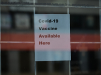 The "Covid-19 Vaccine Available Here" sign seen on the front door of an Edmonton pharmacy.
Alberta has declared a state of public health eme...